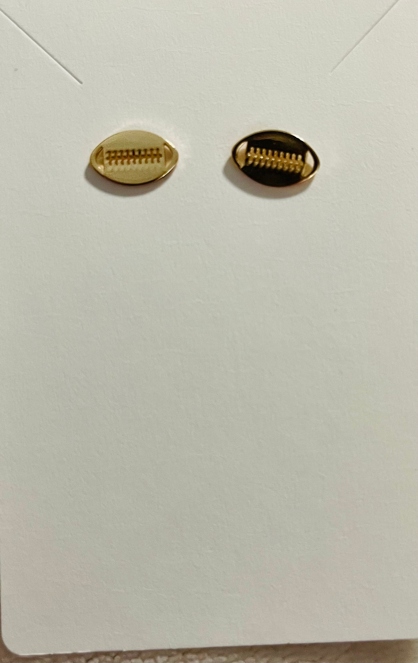 Gold football studs