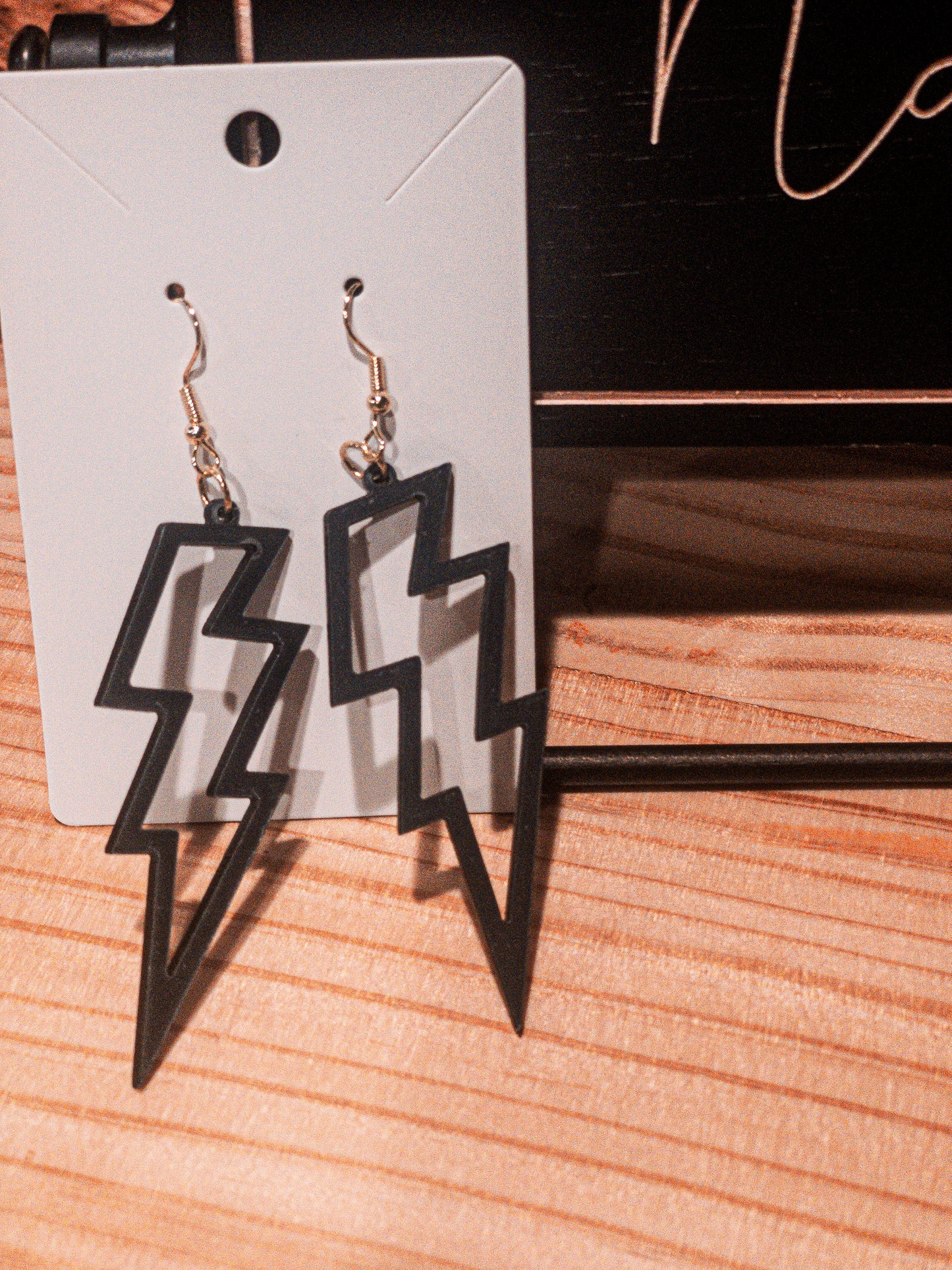 Black lightning bolt earrings