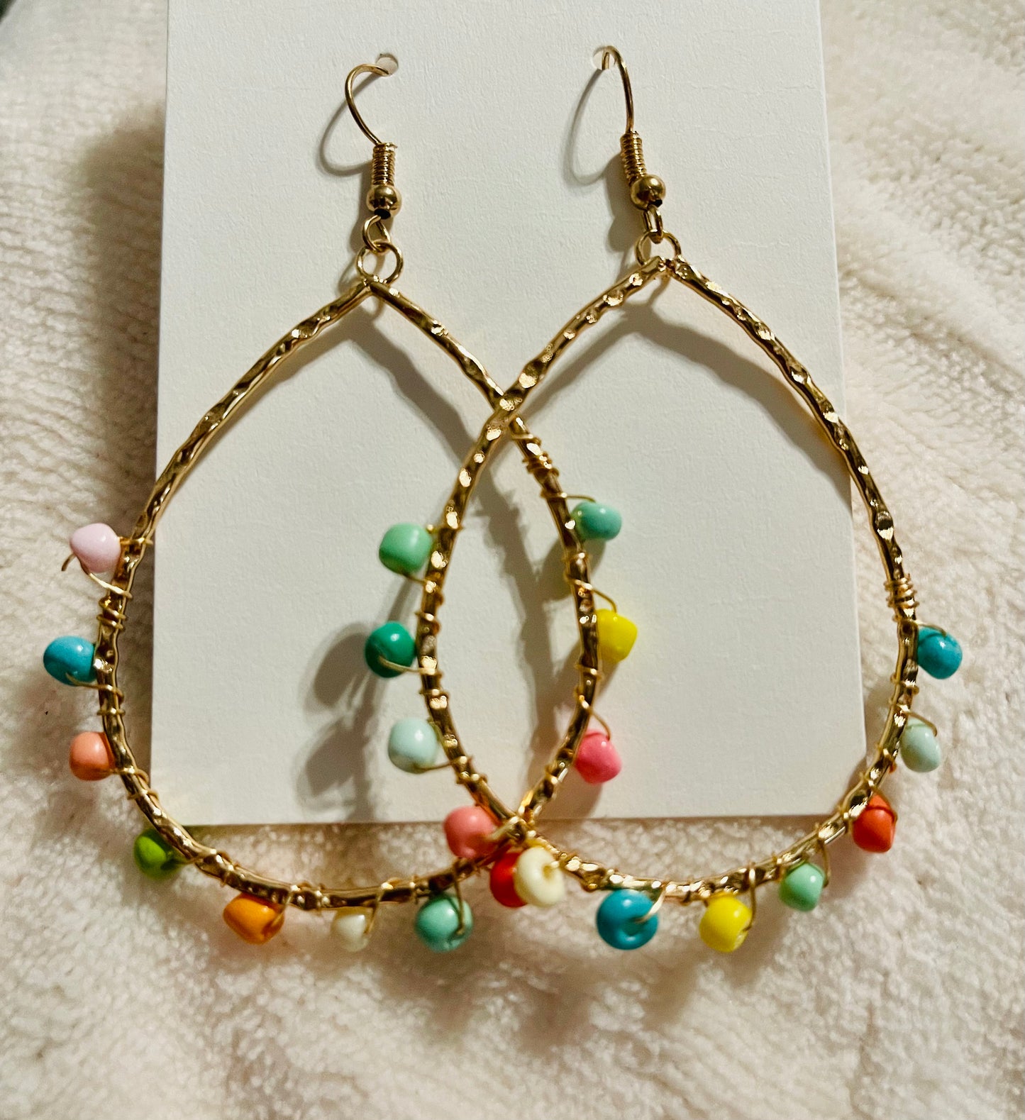 Multi colored spring earrings on gold ovals